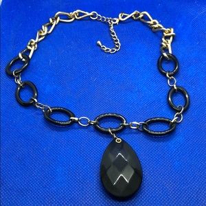 Necklace with large black pear shape bead